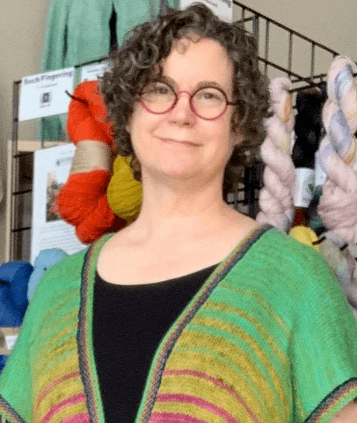 Photo of Laura, owner of 3 Kittens Needle Arts.